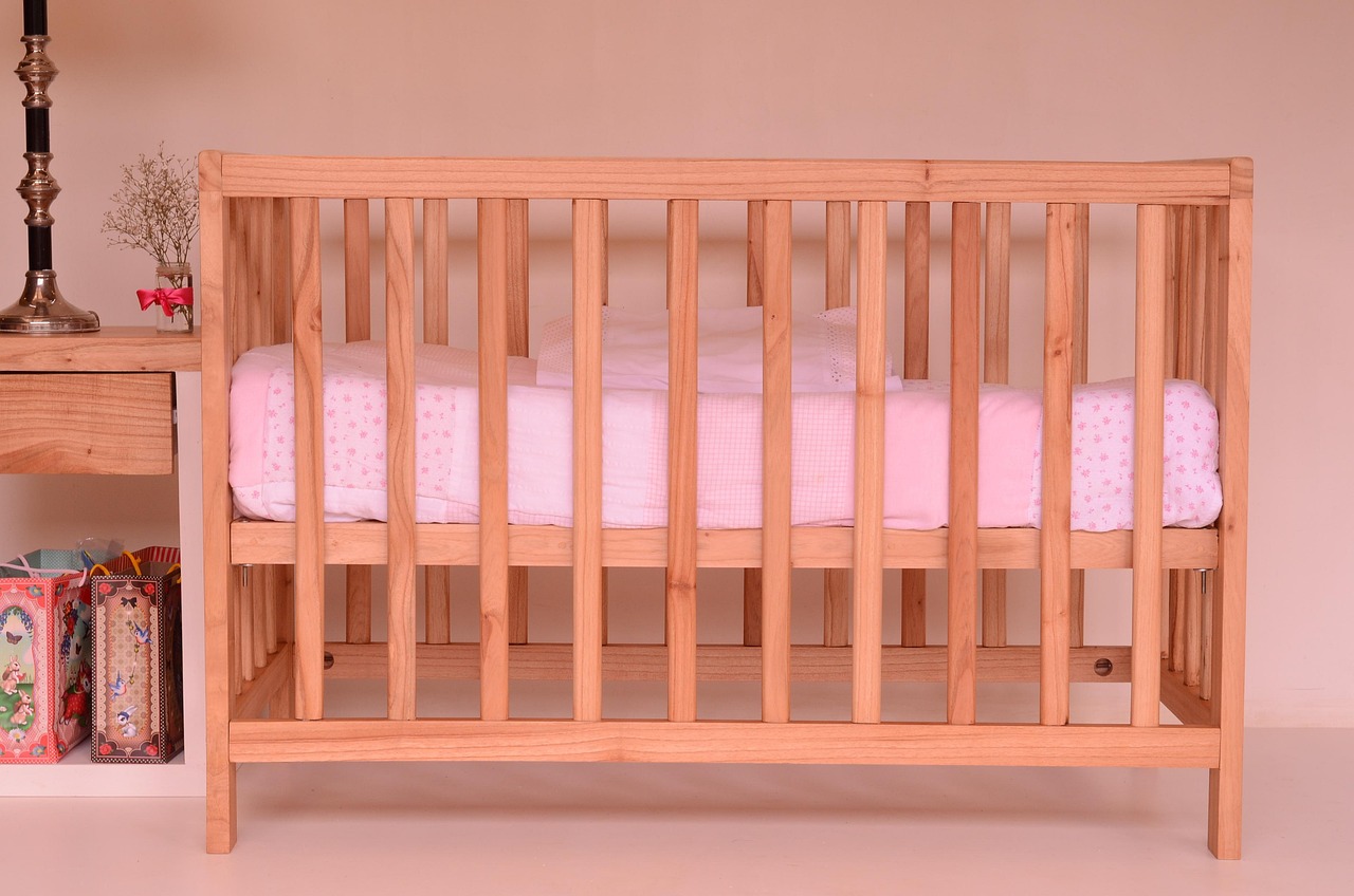 Crib with a fitted sheet and nothing else